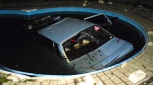 Car in swimming pool